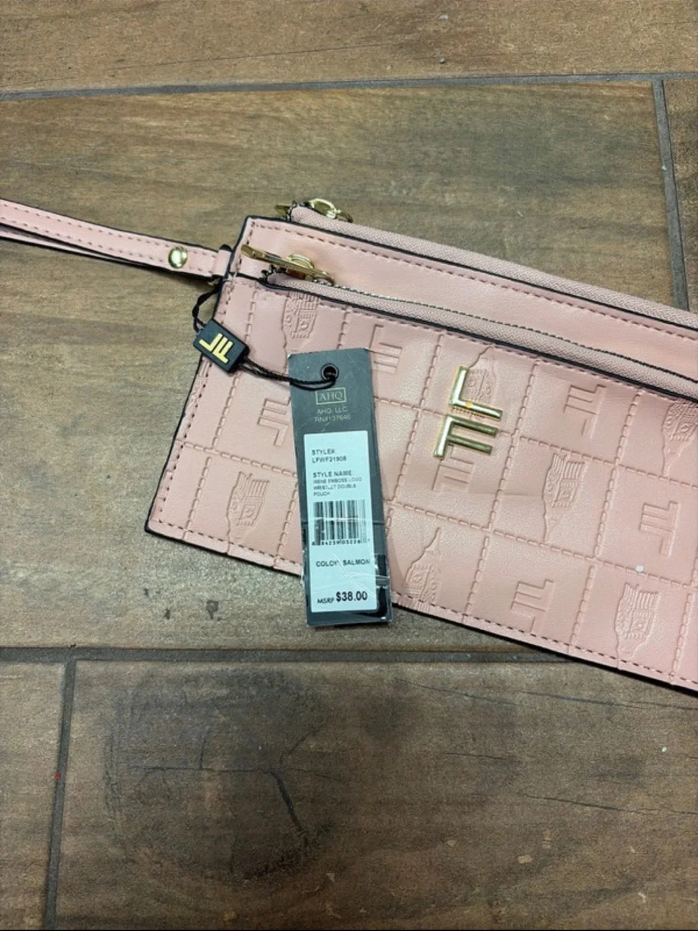 London Fog Blush Pink Embossed Wristlet with Gold Logo